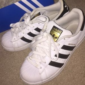 White Adidas Superstars